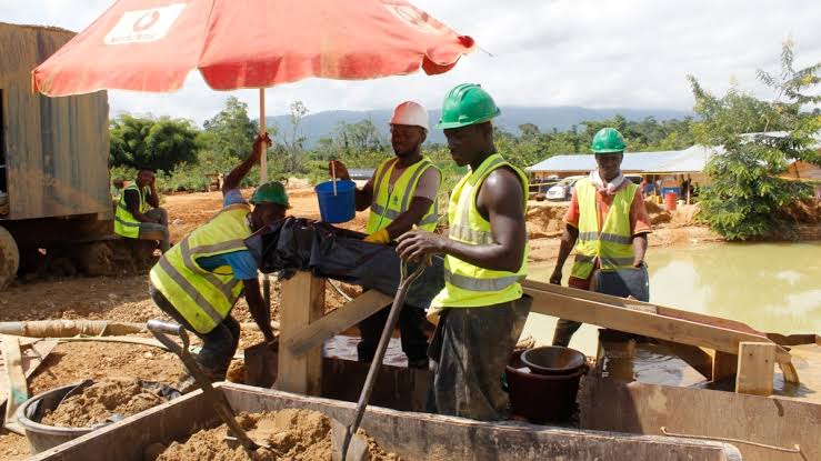 Gold processing at a Ghanaian mining site in West Africa